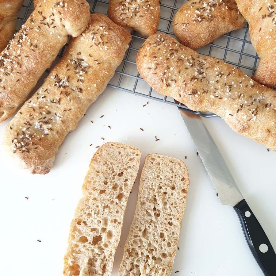 Baked 'Seelen' - hybrid of rolls and baguettes with caraway-salt topping ; typical rolls from the South of Germany - BREADISTA