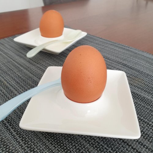 white porcelain egg cups