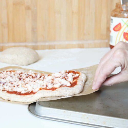 Almweck Pizza - raw dough pulled on up-side-down baking sheet - made with bread mix by BREADISTA