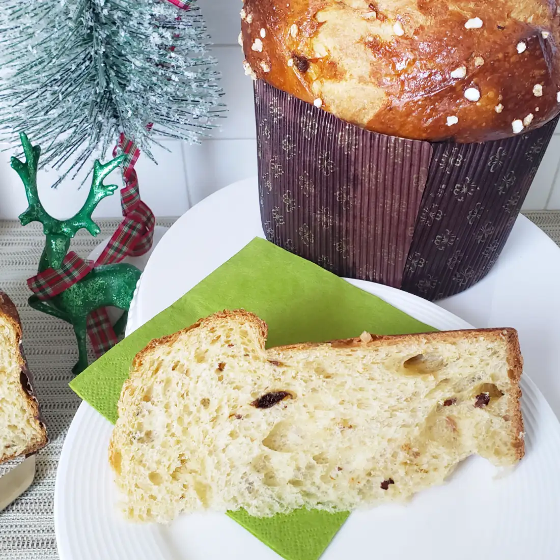 Panettone - Sliced on plate with green napking - by BREADSITA