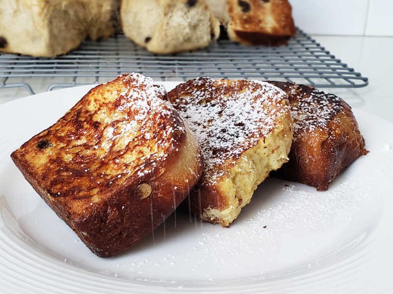 closeup - 3 slices Brioche french toast on white plate by Breadista