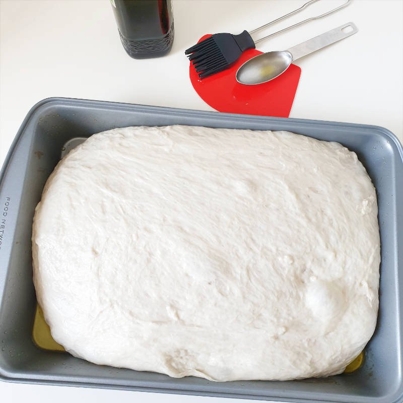 Shape Foccacia - risen dough in pan