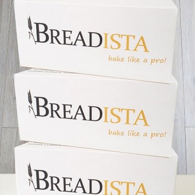 stack of 3 white shipping boxes, each with BREADISTA brand logo