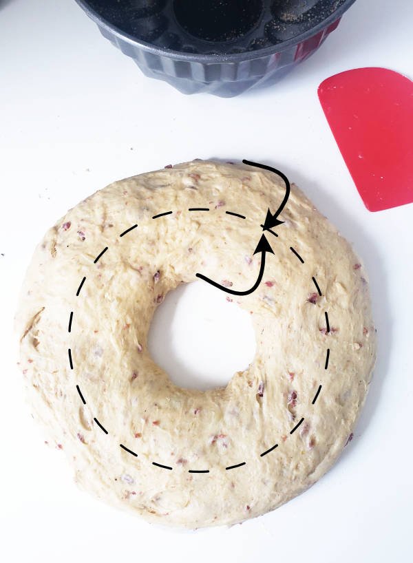 birdview raw dough ring with arrows how to fold together