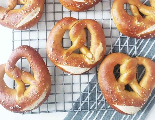 About 'Making German Pretzels' - baked pretzels on rack by BREADISTA