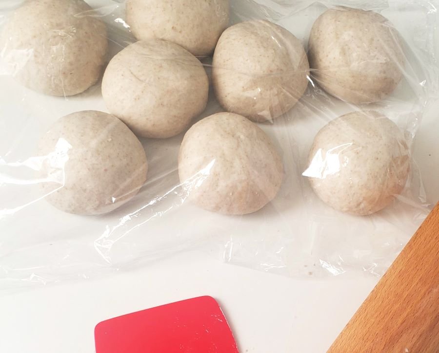 proofen small dough balls covered with cling foil - BREADISTA