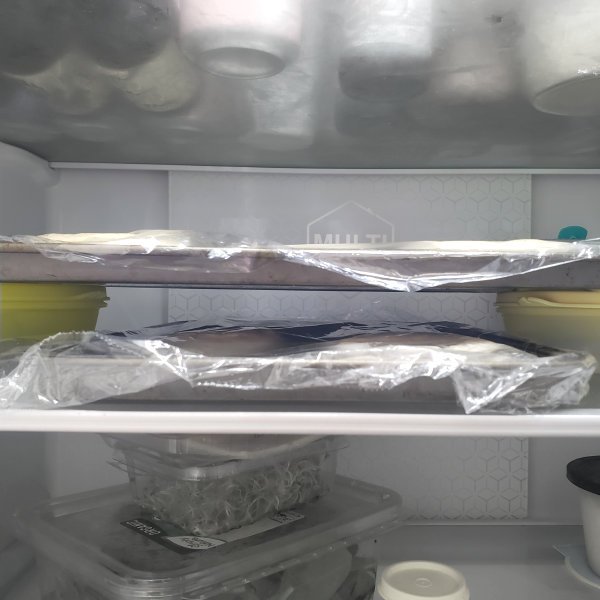Baking Sheets stacked in fridge